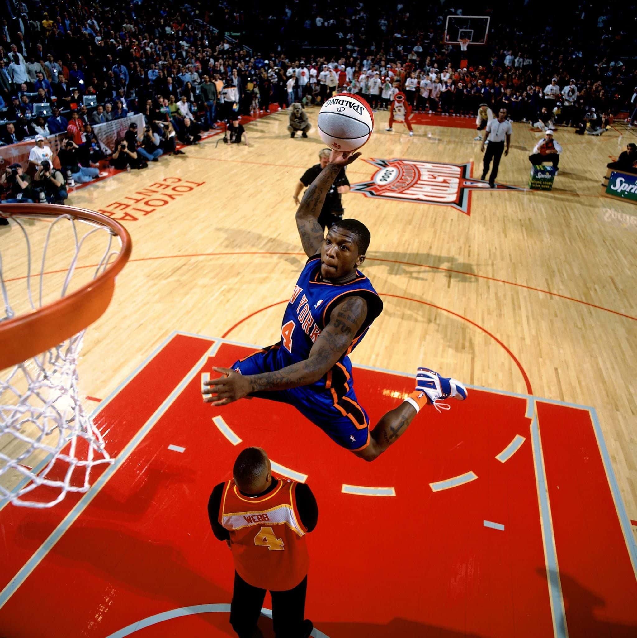 Nate Robinson se lanza sobre Spud Webb