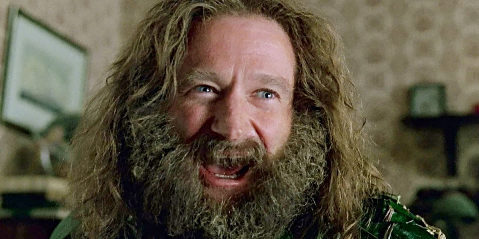 Robin Williams se ríe como Alan Parrish en la película original de Jumanji