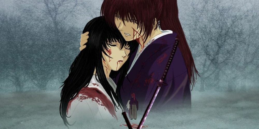 Kenshin sostiene a Tomoe mientras ella muere en sus brazos en Rurouni Kenshin Trust and Betrayal.