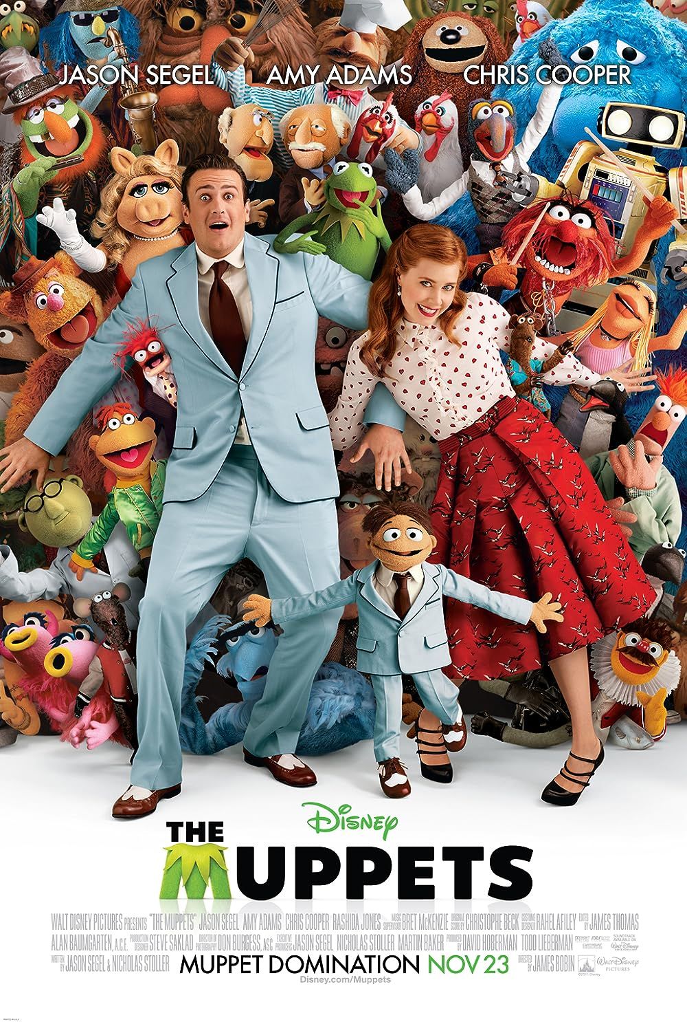 Los Muppets y el elenco humano en el cartel de Los Muppets 2011