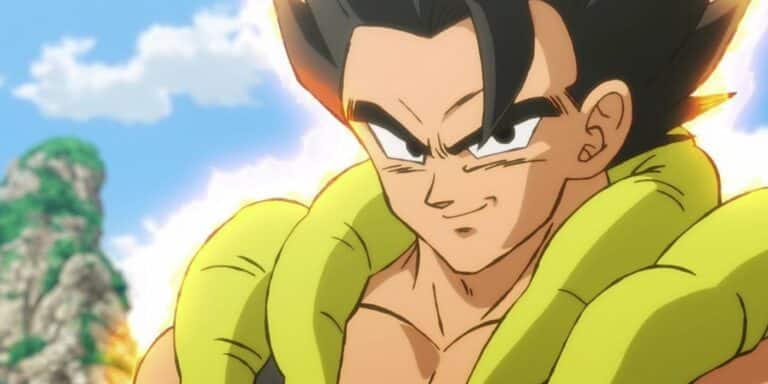 Gogeta smiling with a golden glow around him