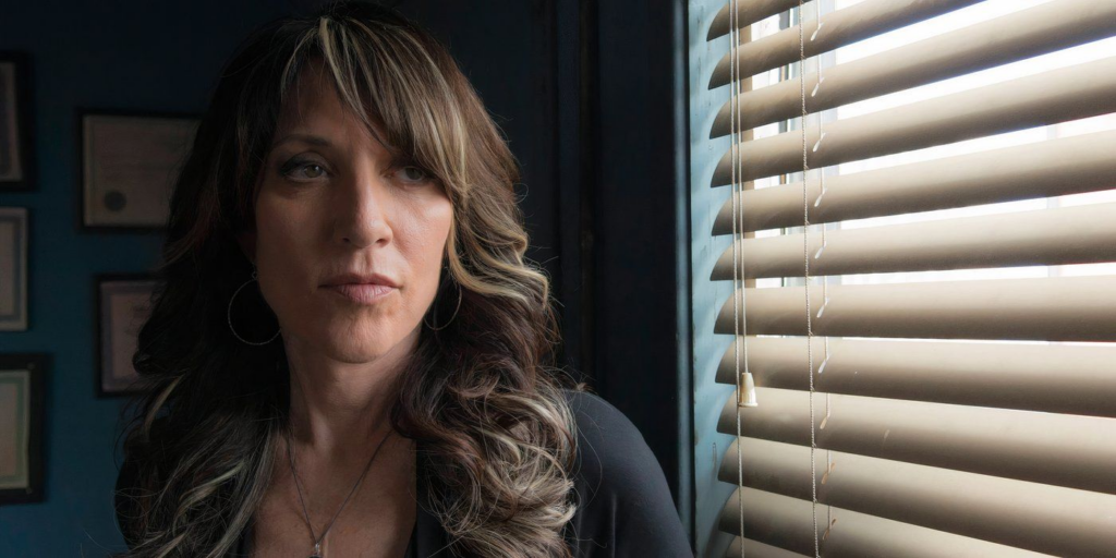 Katey Sagal as Gemma Teller Morrow, thinking about how to kill an enemy outside his house in the sons of anarchy.