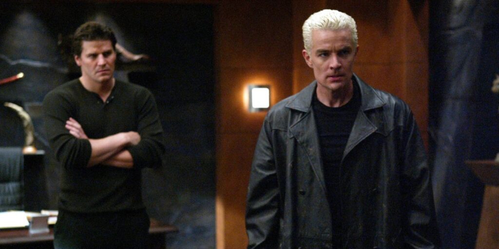 Spike en una oficina con ángel detrás de él