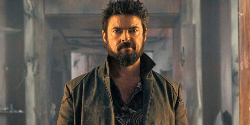 The butcher looks seriously in a pose