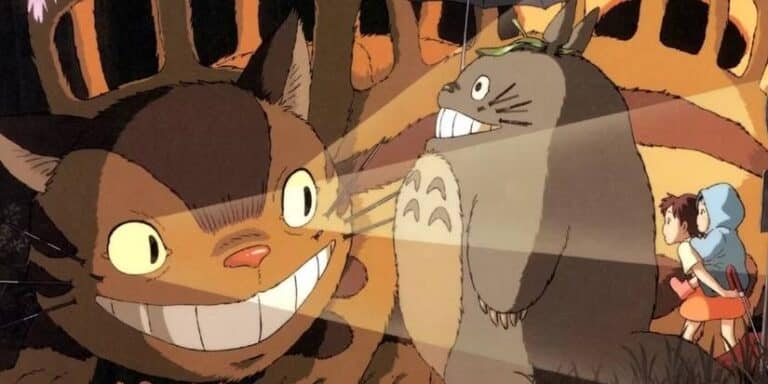 The catbus shines its pockets on Totoro, Satsuki and Mei in my neighbor Totoro.